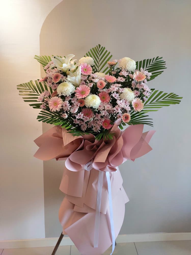pastel pink condonlence flower stand