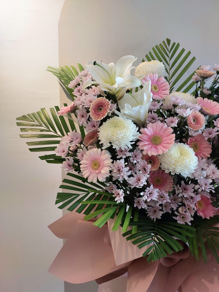 pastel pink condonlence flower stand