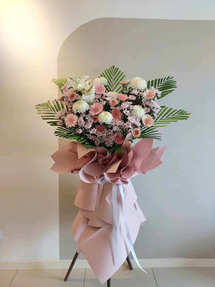 pastel pink condonlence flower stand