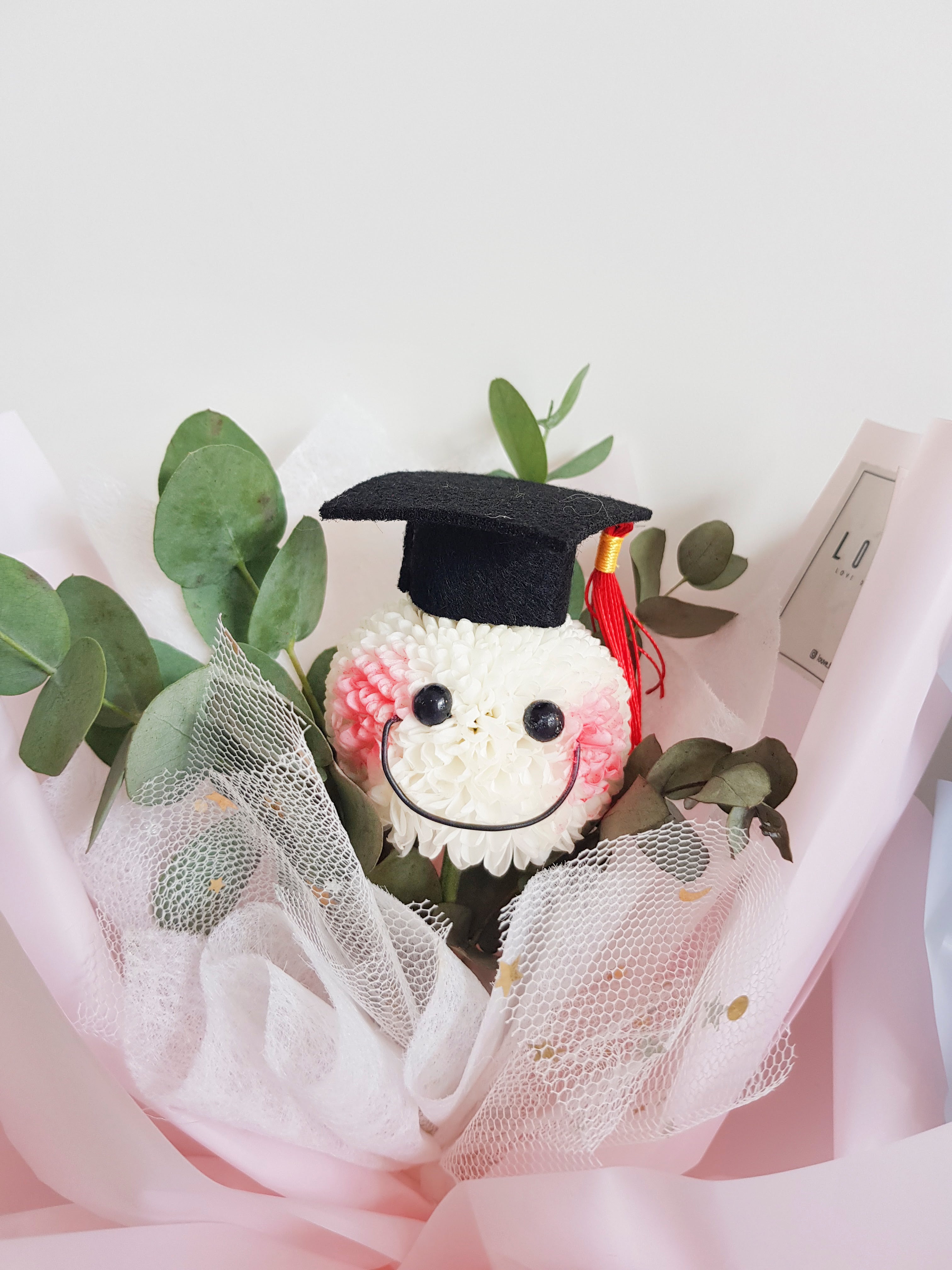 Adam & Eve Graduation Flower Bouquet