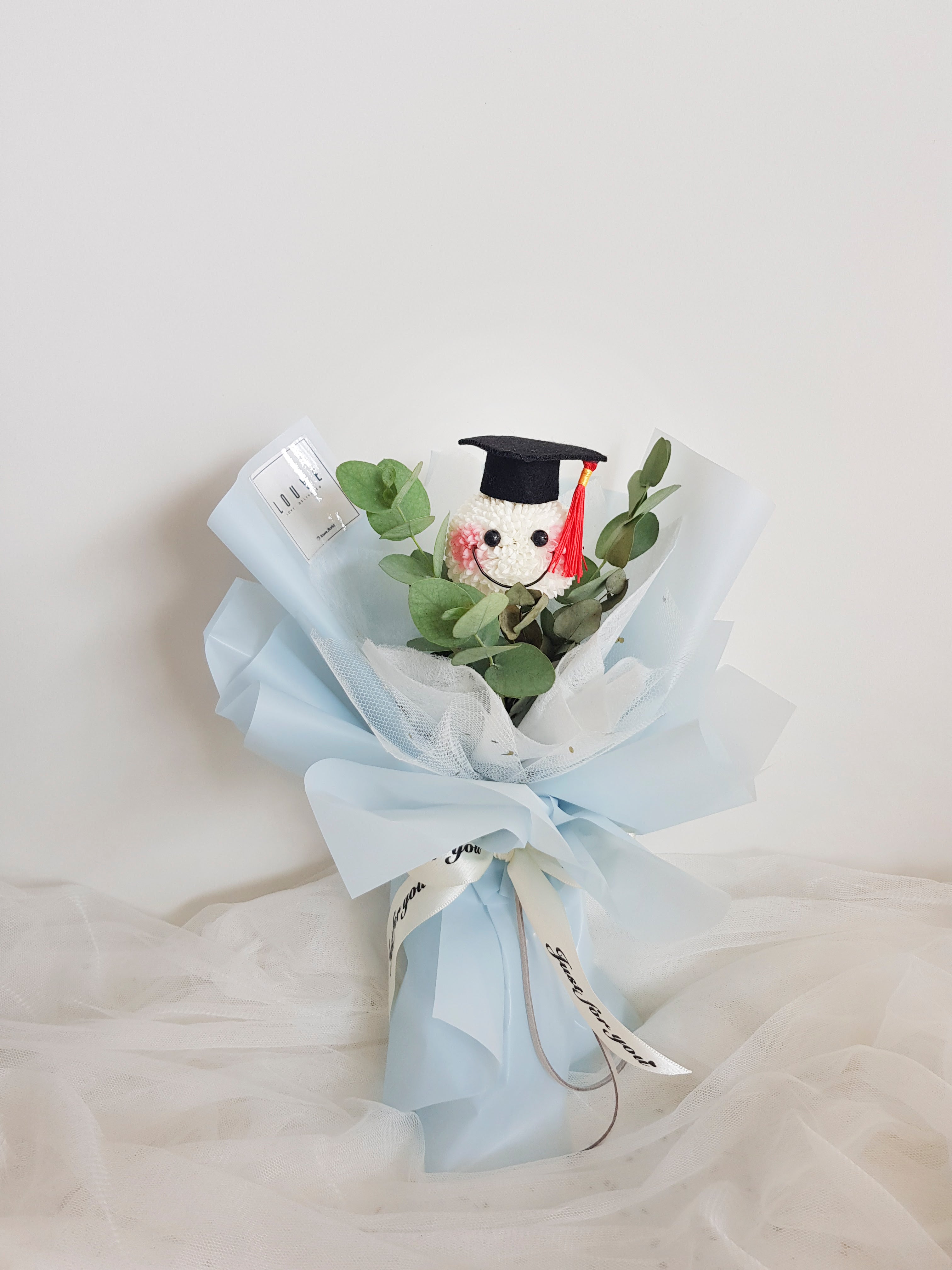 Adam & Eve Graduation Flower Bouquet